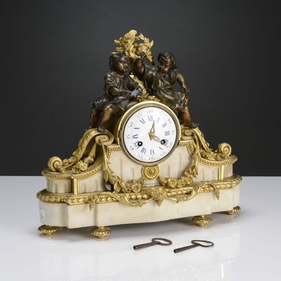 Clock in alabaster and patinated and gilded...