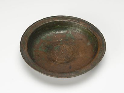 null Plate with marli. Trace of inscription or decoration in its middle.
Bronze with...