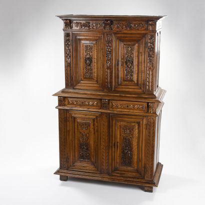 null Piece of furniture with two recessed bodies in carved walnut, it opens with...