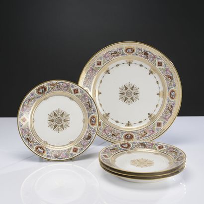 SEVRES 
Four plates and a dish in polychrome...