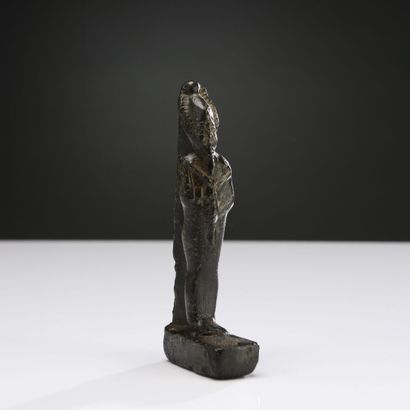 null Statuette d'Osiris momiforme debout, portant le sceptre et le flagellum, et...