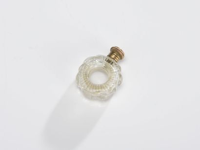 Ring-shaped bottle in cut crystal, 
19th...