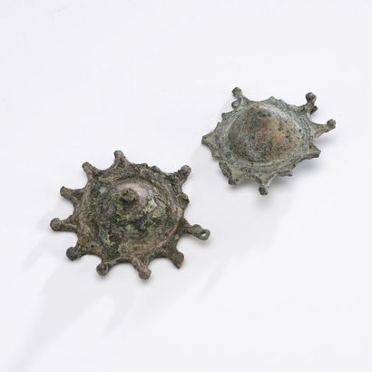 Pair of truncated cone-shaped fibulas with...
