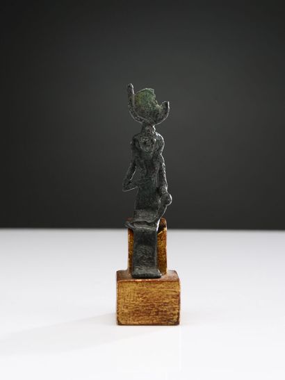 null Statuette of Isis lactans, representing the goddess Isis seated, carrying her...