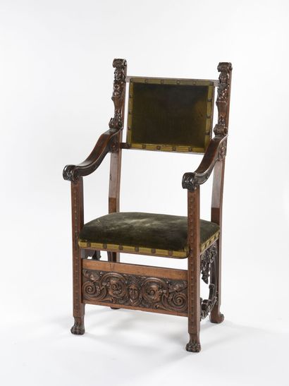 null Pair of armchairs with carved walnut arms. The amount of the backs is formed...
