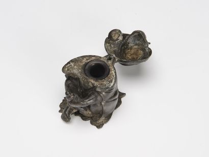 null JAPAN, Metal inkwell featuring a seated macaque holding bezels and observing...