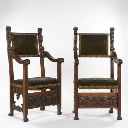 Pair of armchairs with carved walnut arms....