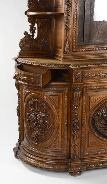 null Important oak hunting buffet richly carved with hunting trophies.
It opens with...