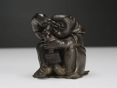 null JAPAN, Metal inkwell featuring a seated macaque holding bezels and observing...