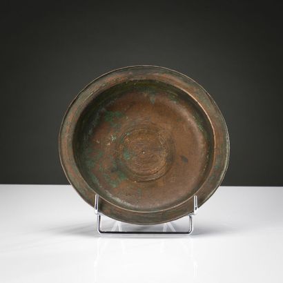 null Plate with marli. Trace of inscription or decoration in its middle.
Bronze with...