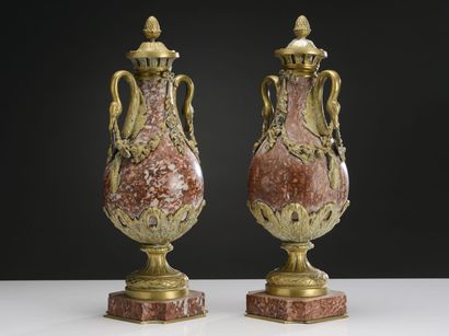 null Pair of marble fire pots with bronze mountings
Louis XVI style
19th century
H...