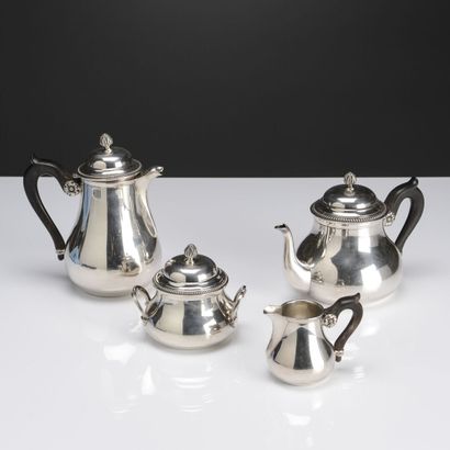 Tea and coffee set in plain silver decorated...