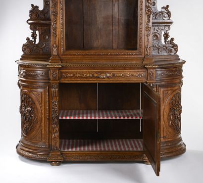 null Important oak hunting buffet richly carved with hunting trophies.
It opens with...