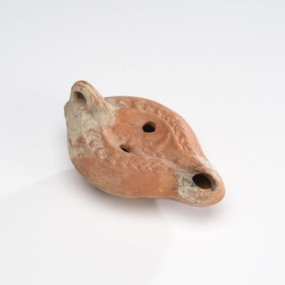 Oil lamp with channel spout decorated with...