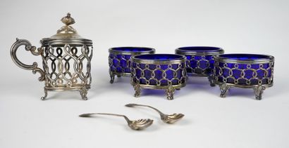 null Four oval silver salting bowls decorated with blue glass interiors.
Minerva...