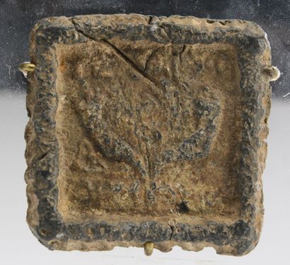 null Quadrangular weight stamped with two cornucopia and an inscription in Greek...