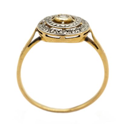 null Antique platinum and yellow gold and white gold (750) 18K circular basket ring...