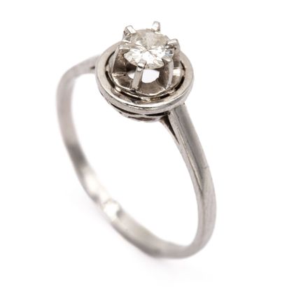 null Platinum ring, set with a solitaire old cut diamond weighing approximately 0.30...