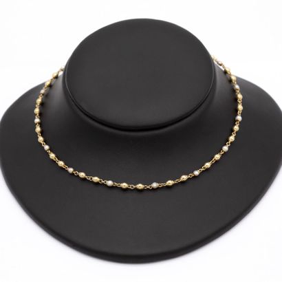 null Necklace in yellow gold (750) 18K suite of gold beads alternated with cultured...