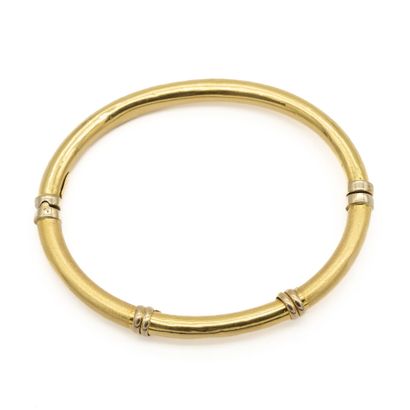 null Bracelet jonc ouvrant en or jaune (750) 18K mat et brillant, à décor de godrons....