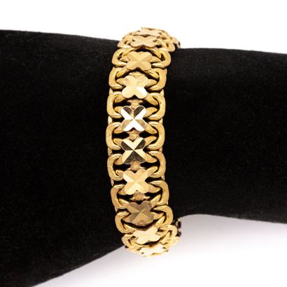 null Bracelet in 18 K (750) yellow gold with a four-leaf clover. 
Weight 29 g 
length...