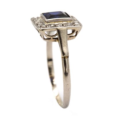 null Gold and platinum ring, rectangular basket, set with a square blue imitation...