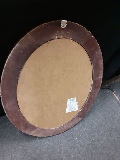 null Miroir de forme ovale
Cadre en bois doré 
39 x 28 cm 
