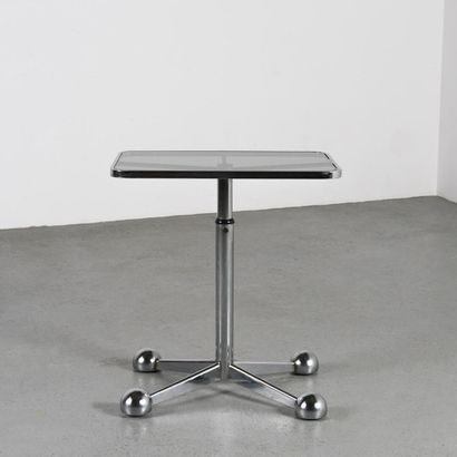 null ARREDAMENTI ALLEGRI, Parma

Side table with chrome-plated steel structure resting...