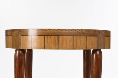 null ART DECO WORK

Pedestal table with a circular top veneered with sunbursts and...