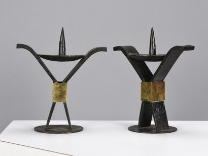 null LYON WORK
Pair of wrought iron and hammered picks decorated with a golden square...