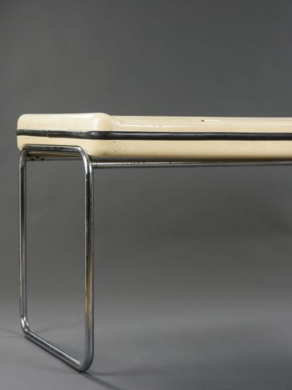 null Marc HELD (Born in 1932)

Desk with a chromed tubular metal structure on which...