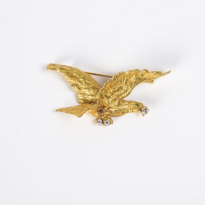 Brooch in 18K (750) yellow gold, depicting...