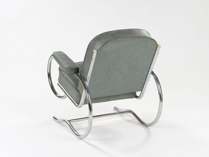 null BAUHAUS WORK

Armchair with tubular structure in chromed metal from which rests...