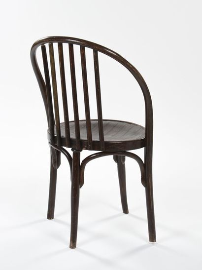 null Jacob & Josef kohn Vienna

Armchair in dark stained wood with arched back and...