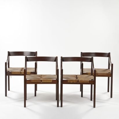 null FRENCH WORK

Suite of four armchairs with dark stained beech frame with visible...