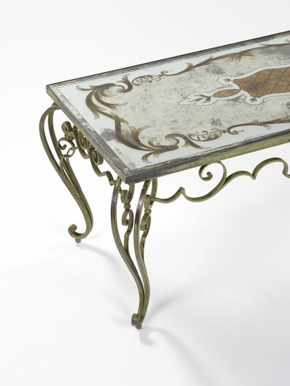 null FRENCH WORK 1940

Low table in wrought iron with green patina with scrolls and...