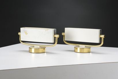 null Jacques BINY (1913-1976)

Pair of sconces with a circular base holding a brass...