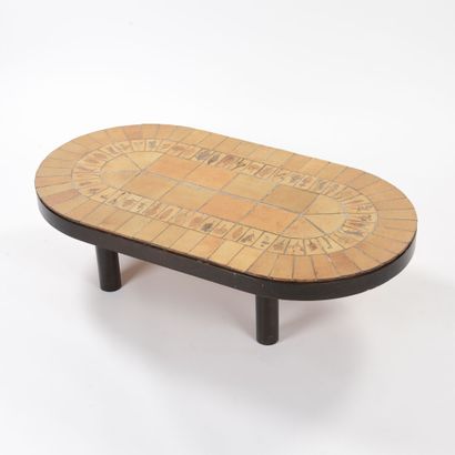null Roger CAPRON (1922-2006)

Low table of oval shape Herbiers model decorated with...