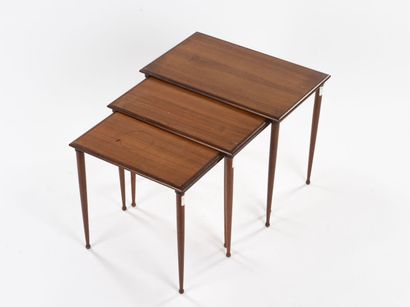 null SCANDINAVIAN WORK

Suite of three nesting tables with tapered legs ending in...