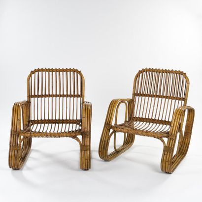 null Attributed to BONANCINA

Pair of armchairs with large curved bamboo canes and...