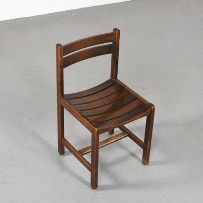 null André SORNAY (1902-2000)

Suite of eight chairs all dark tinted wood with a...