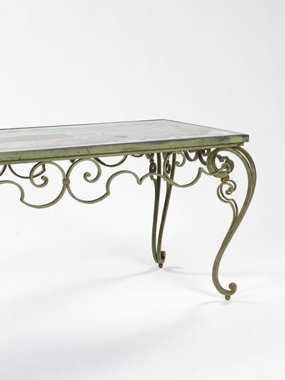 null FRENCH WORK 1940

Low table in wrought iron with green patina with scrolls and...