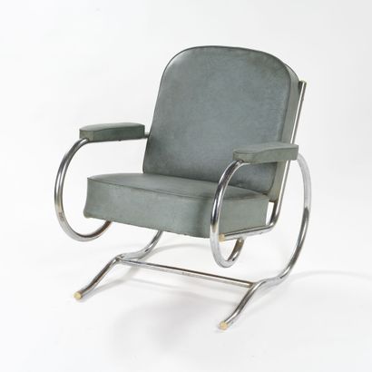 null BAUHAUS WORK

Armchair with tubular structure in chromed metal from which rests...