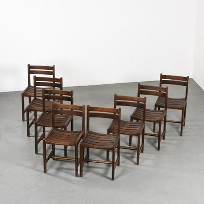 null André SORNAY (1902-2000)

Suite of eight chairs all dark tinted wood with a...