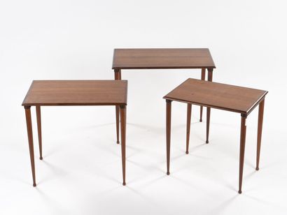 null SCANDINAVIAN WORK

Suite of three nesting tables with tapered legs ending in...