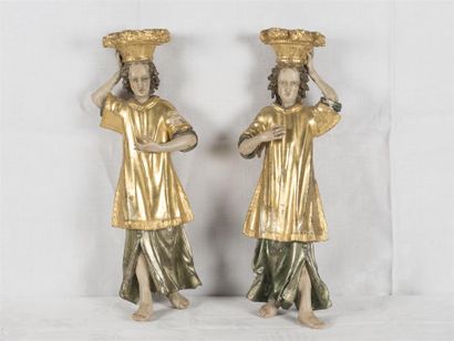 null Paire de sujets en bois sculpté et doré, anges porteurs de panier
Allemagne...