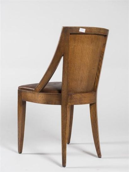 null CHRISTIAN KRASS (1868 - 1957)
Suite de huit chaises en chêne massif et simili...