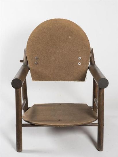 null Travail 1950 
Fauteuil «rondins» à structure en bois et assise et dossier garnis...