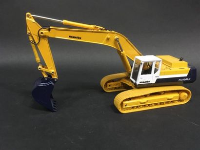 null KOMATSU pelleteuse
L chenilles 17 cm
bon état