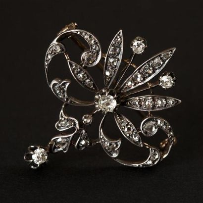 null Broche en or et argent figurant une aigrette sertie de diamants taille rose....